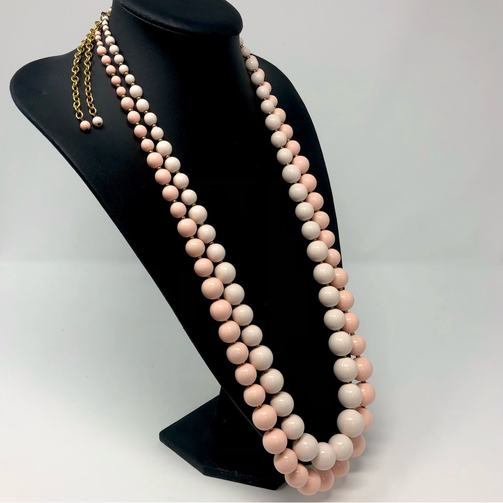 Bundle of two Joan Rivers graduated long pink bead necklaces